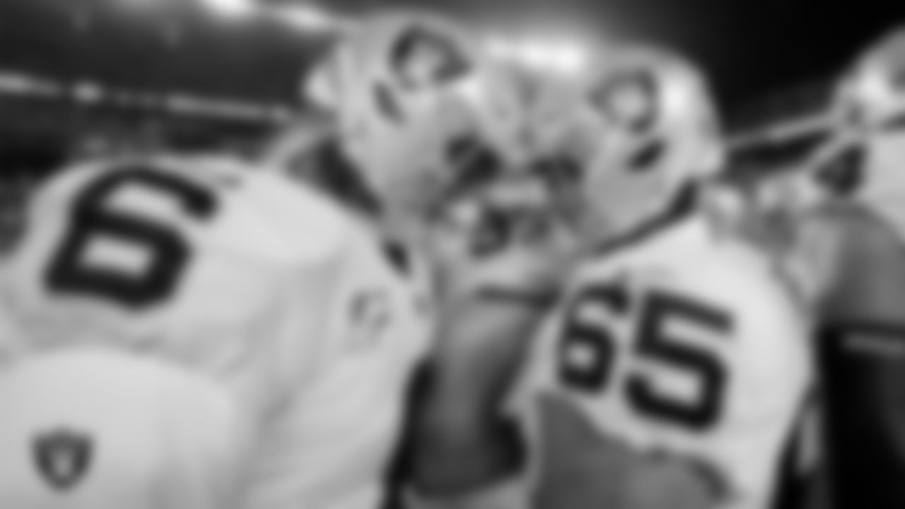 Las Vegas Raiders punter AJ Cole (6) and offensive lineman Hroniss Grasu (65) warming up before the regular season away game against the Pittsburgh Steelers at Acrisure Stadium.