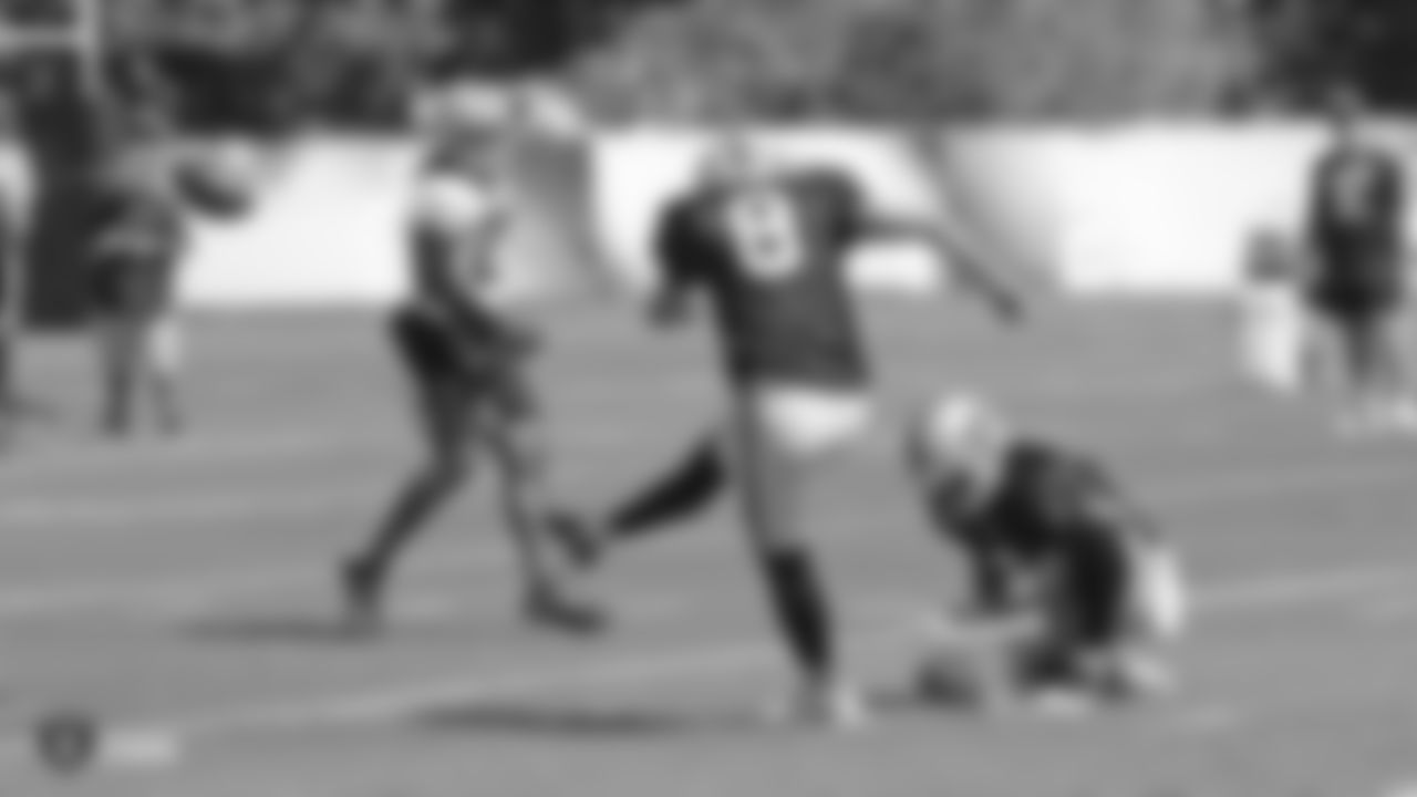Raiders kicker Daniel Carlson (8) and punter A.J. Cole (6) on the field for practice.