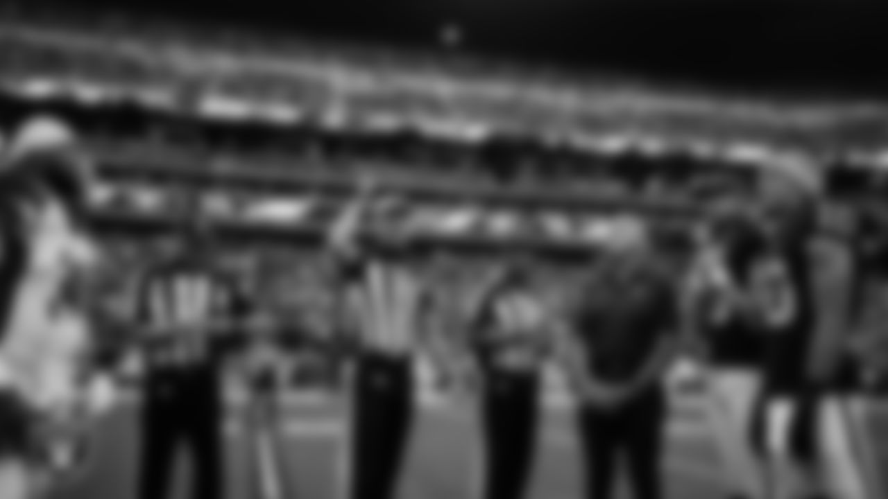 Las Vegas Raiders alumnus Jim Plunkett, punter AJ Cole (6) and wide receiver Mack Hollins (10) during the coin toss before the regular season home game against the Arizona Cardinals at Allegiant Stadium.