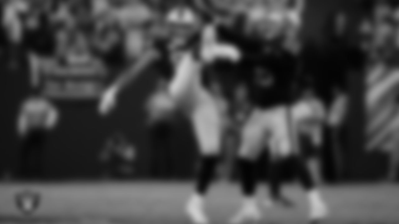 Las Vegas Raiders defensive end Maxx Crosby (98) and defensive end Isaac Rochell (96) during the regular season home game against the Green Bay Packers at Allegiant Stadium.