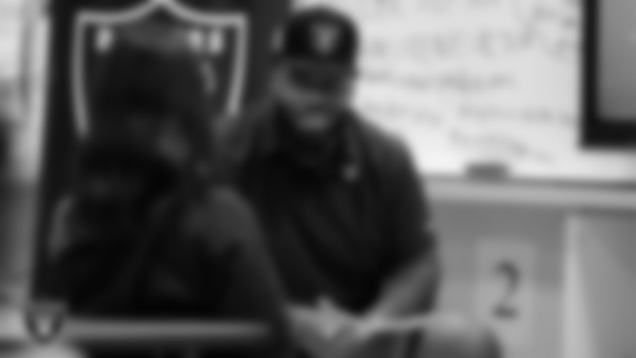 Las Vegas Raiders defensive tackle John Jenkins (95) talks to students during the Hip Hop Entrepreneurship Program Academy at Grant Sawyer Middle School.