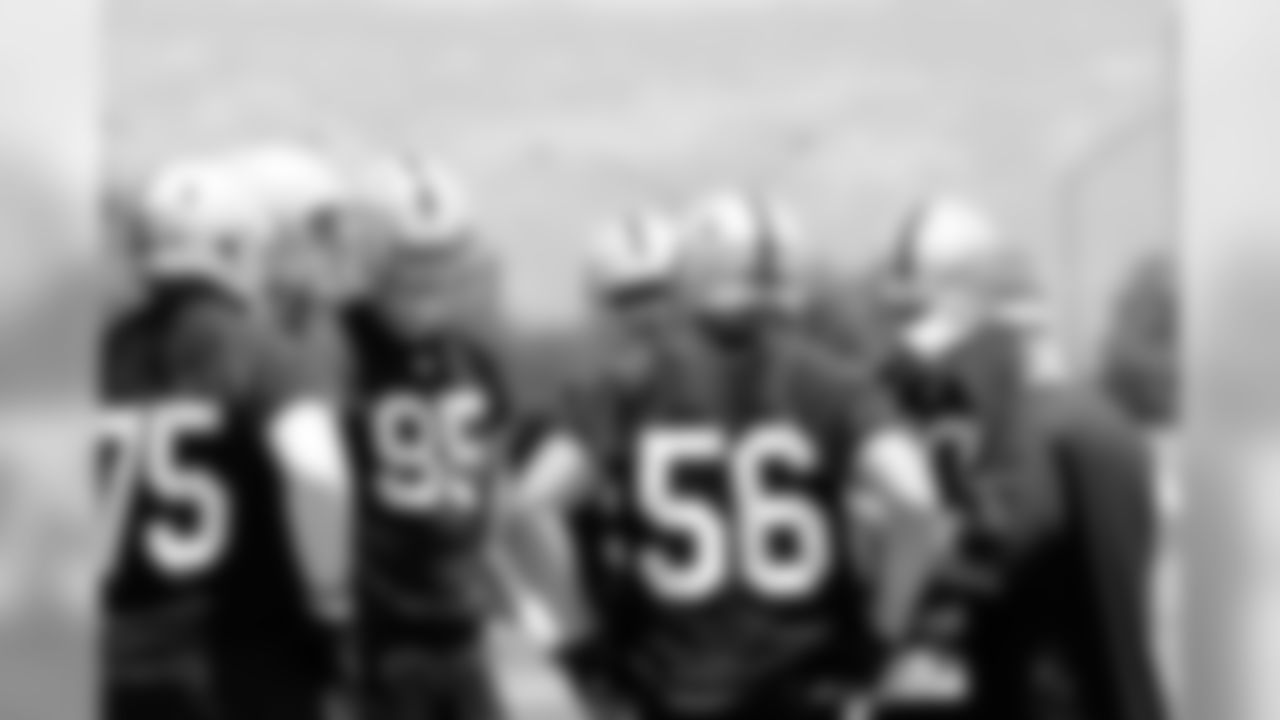 Defensive coordinator Jason Tarver gives the defense the play.