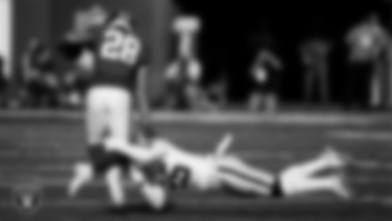 Las Vegas Raiders safety Tre'von Moehrig (25) makes a tackle during the regular season away game against the New York Giants at MetLife Stadium.