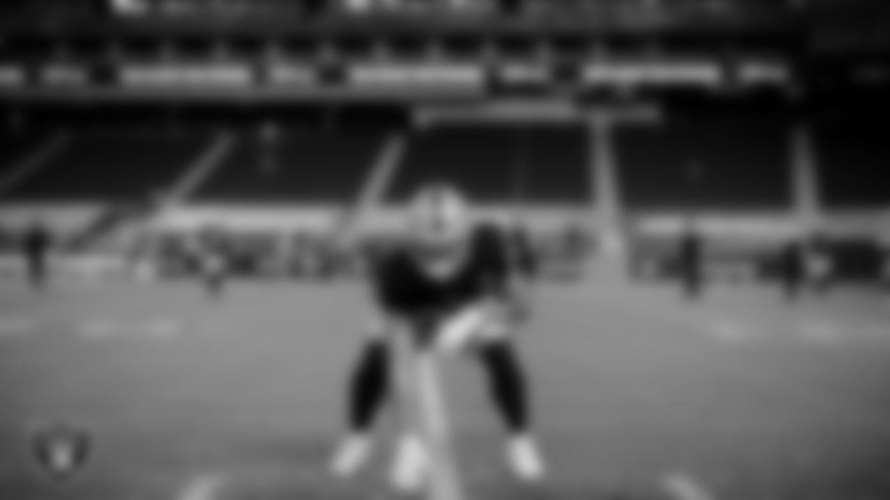The Raiders warm up before the regular season game against the Miami Dolphins at Allegiant Stadium.