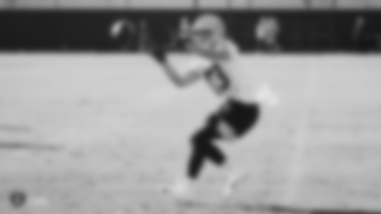Raiders wide receiver Hunter Renfrow (13) goes for a catch during practice.