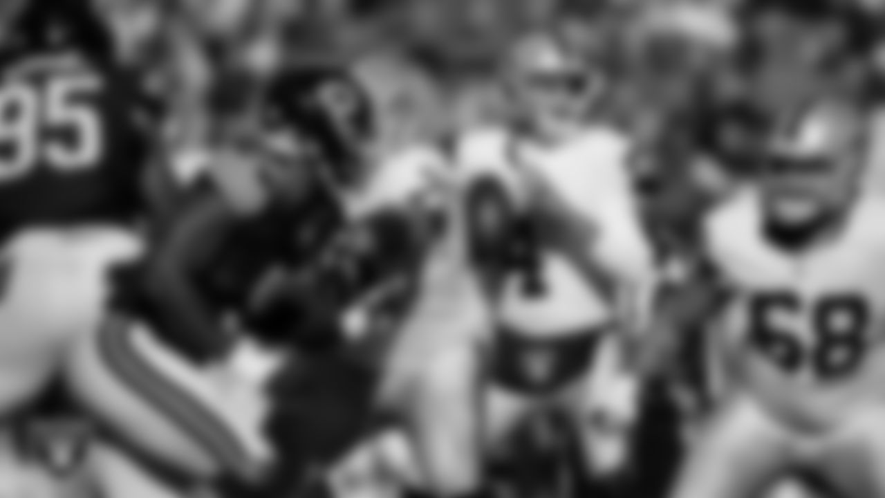 Las Vegas Raiders quarterback Aidan O'Connell (4) during the regular season away game against the Chicago Bears at Soldier Field.