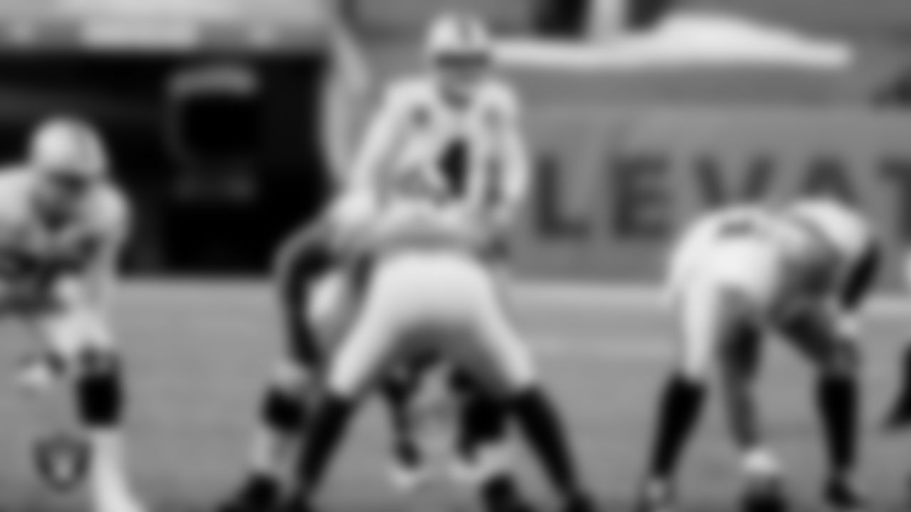 Las Vegas Raiders quarterback Derek Carr (4) during the regular season game against the Denver Broncos at Empower Field at Mile High.