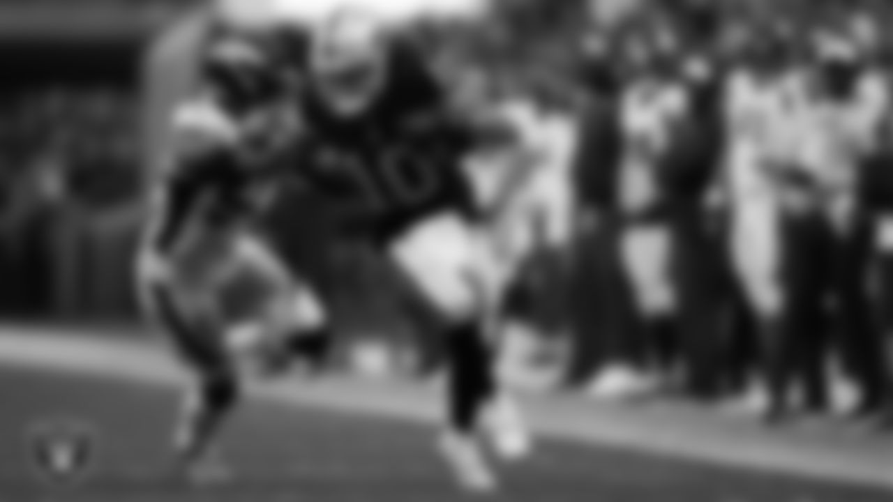 Las Vegas Raiders wide receiver Mack Hollins (10) runs after making a catch during the regular season home game against the Denver Broncos at Allegiant Stadium.