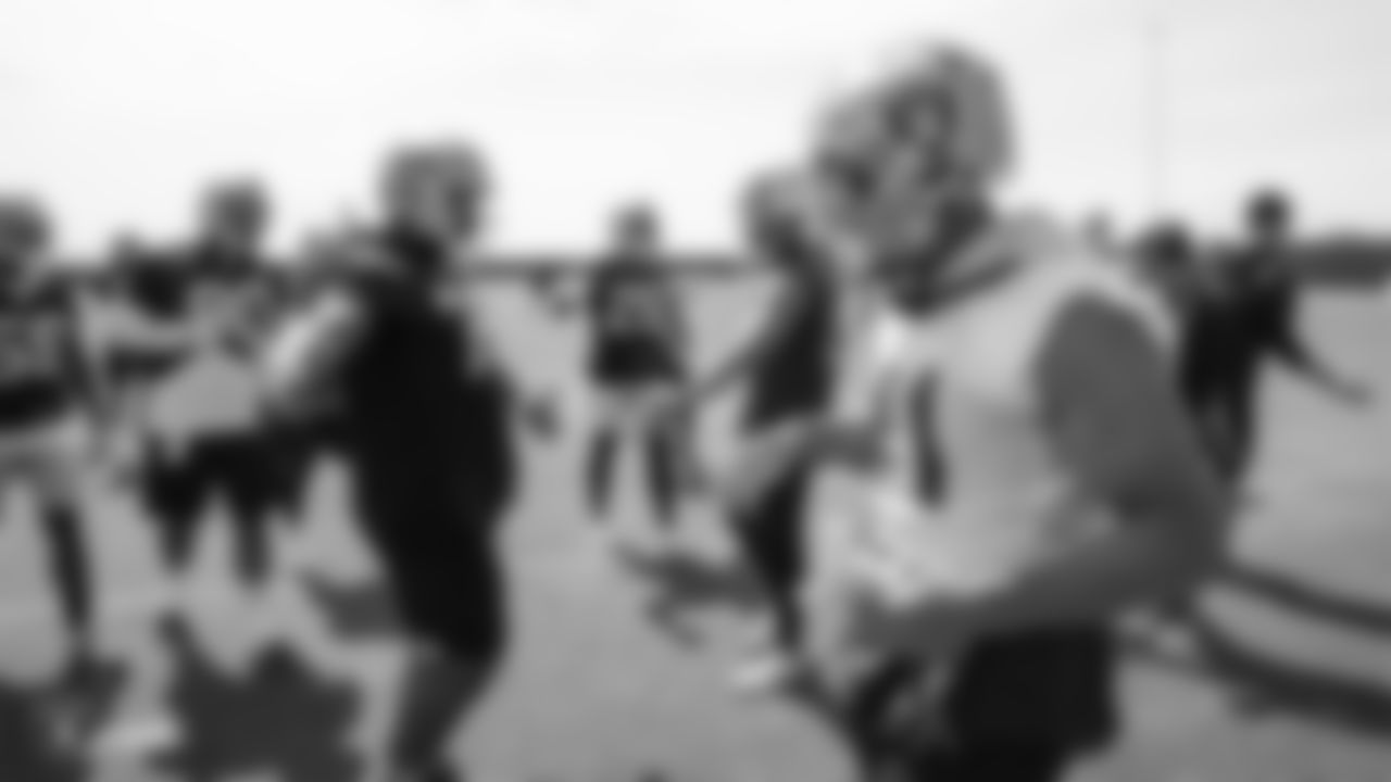 Raiders defensive tackle Justin Ellis (78) and fullback Keith Smith (41) at an Organized Team Activity (OTA) at the Raiders Practice Facility in Alameda, Calif.