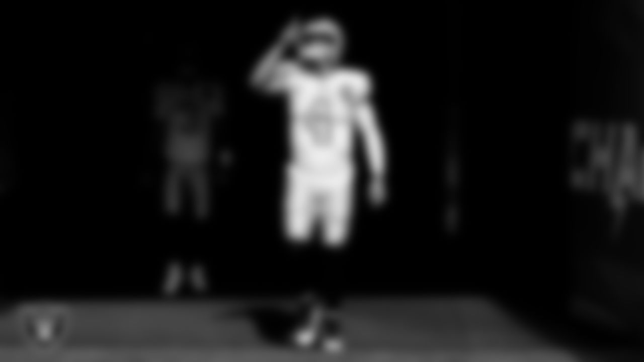The Raiders warm up before the regular season game against the Los Angeles Chargers at SoFi Stadium.