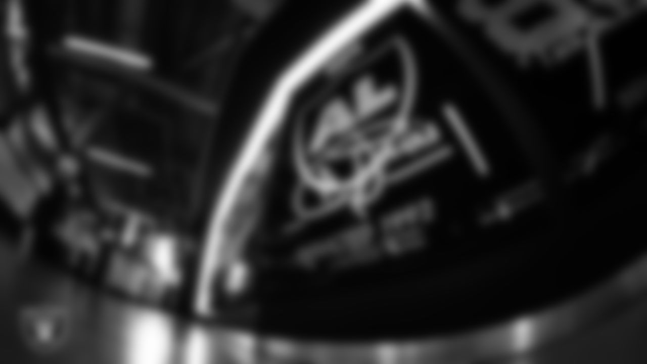 Las Vegas Raiders signage around Allegiant Stadium before the regular season home game against the Dolphins.