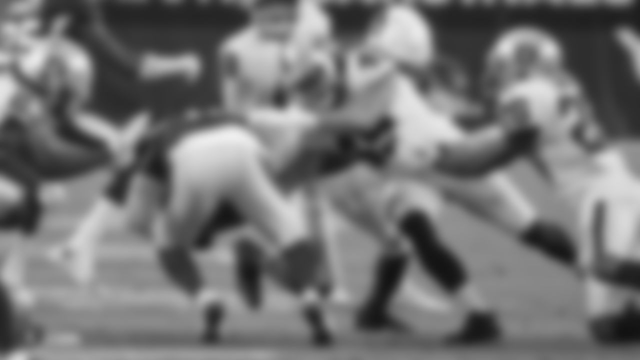 Raiders linebacker/defensive end James Cowser (49) looks to make a tackle during the Raiders preseason game against the Arizona Cardinals.