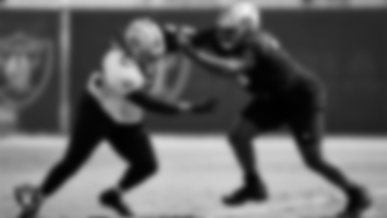 Las Vegas Raiders defensive tackle Darius Philon (96) and guard John Simpson (76) during practice at Intermountain Healthcare Performance Center.