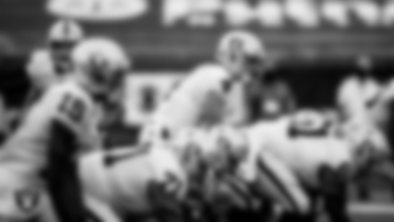Las Vegas Raiders quarterback Derek Carr (4) lines up before the snap during the regular season away game against the New England Patriots.