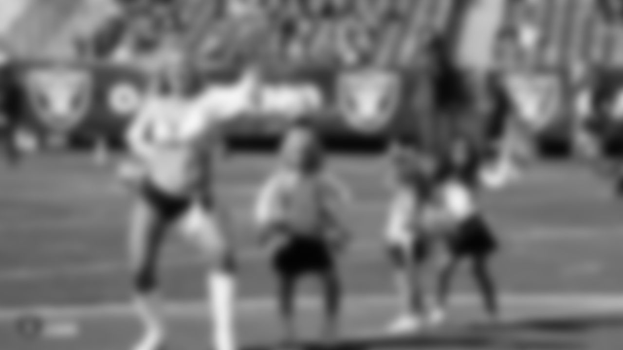 The Raiderettes and Junior Raiderettes perform on the field before the Raiders game against the Los Angeles Rams.