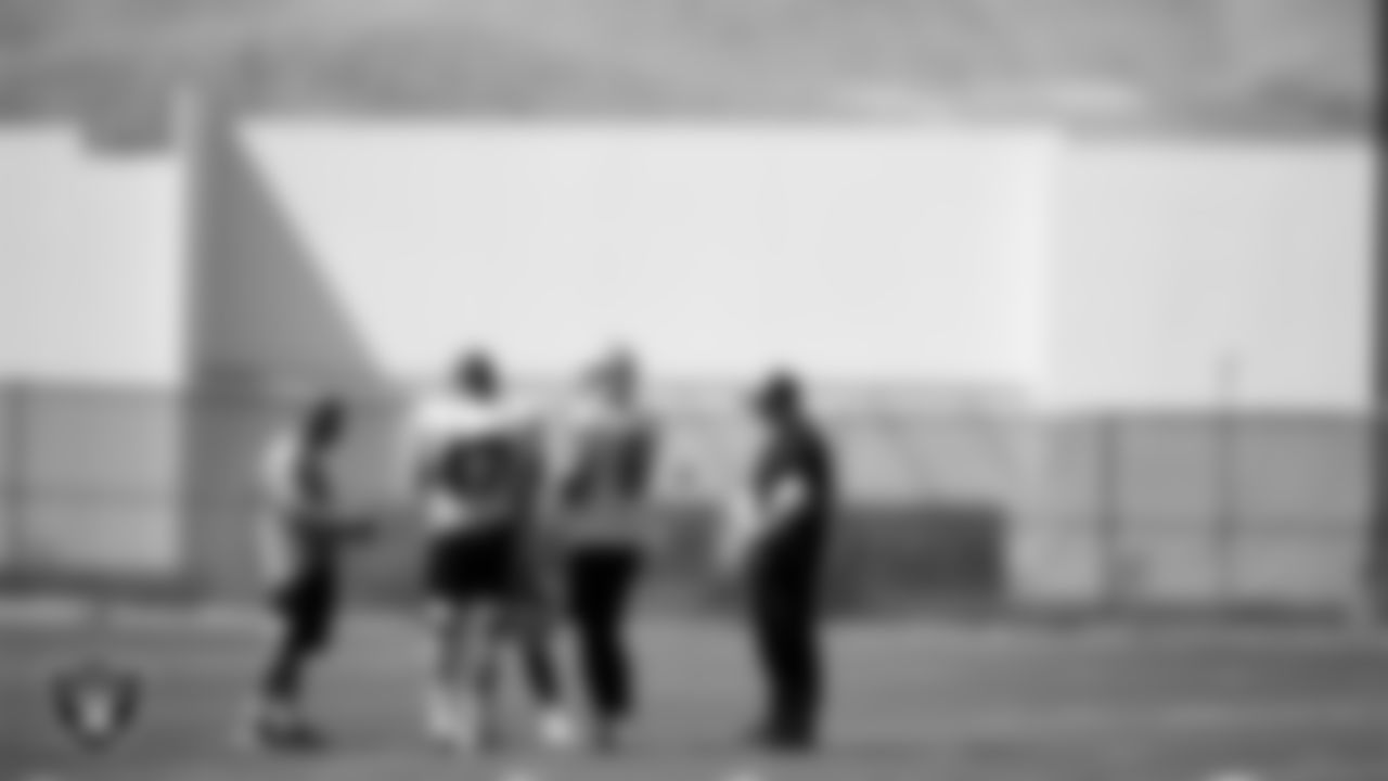 Las Vegas Raiders assistant head coach and special teams coordinator Rich Bisaccia, long snapper Trent Sieg (47), kicker Daniel Carlson (2), punter AJ Cole (6) and assistant special teams coach Byron Storer on the field for a walkthrough.