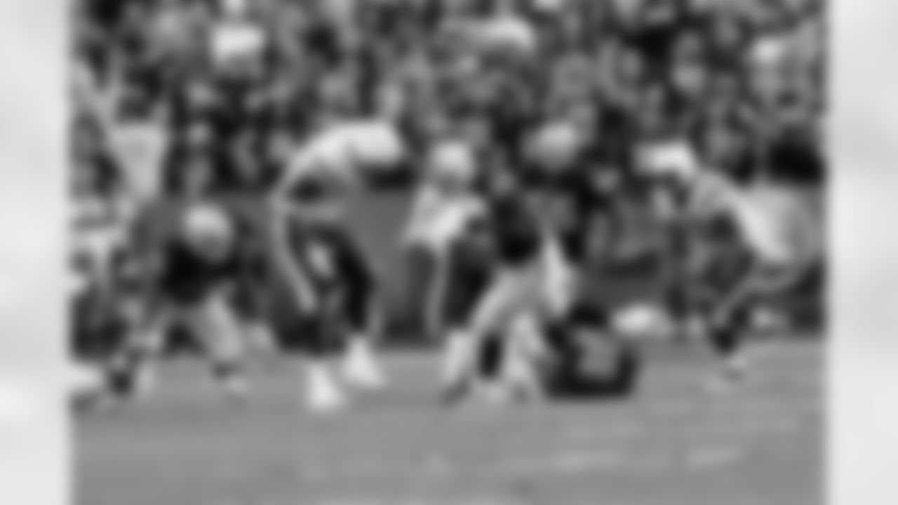 DT Richard Seymour wraps up the ball carrier.