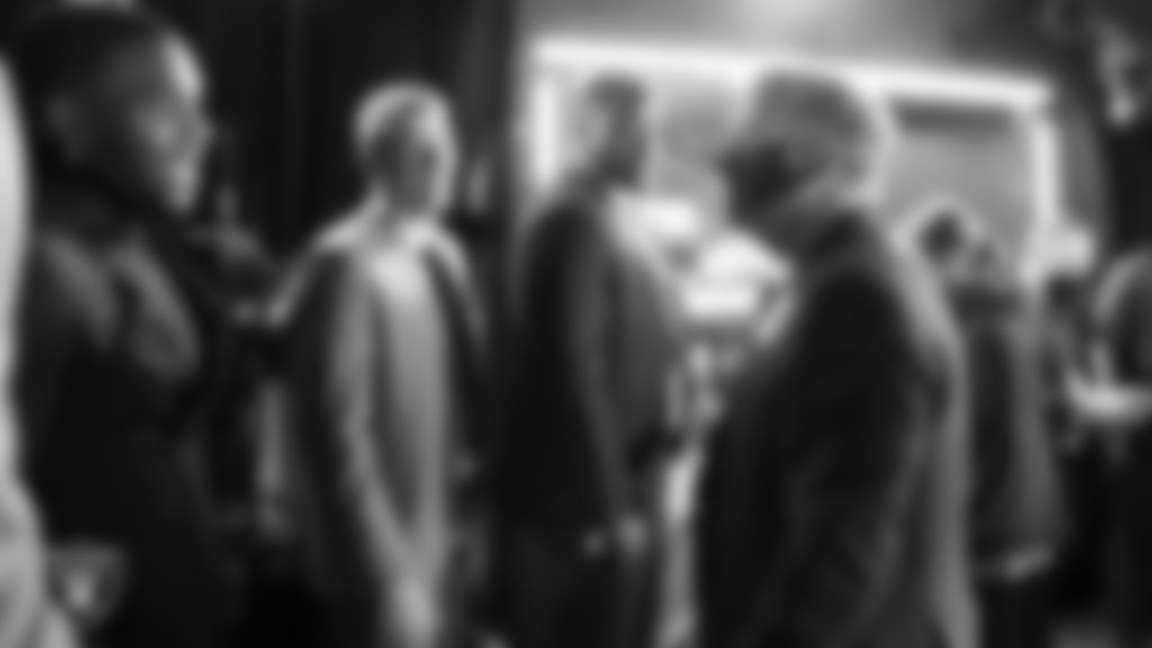 NFL Commissioner Roger Goodell greets players back stage during the 2021 NFL Draft.