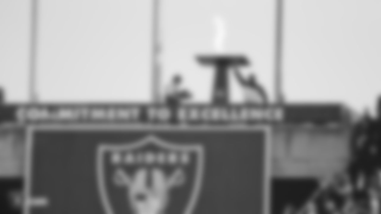American hip-hop artist, Oakland native, and longtime Raiders fan MC Hammer lights the Al Davis torch before the Oakland Raiders regular season game against the Los Angeles Chargers at Oakland-Alameda County Coliseum, Sunday, November 11, 2018, in Oakland, California. The Oakland Raiders lost 20-6.