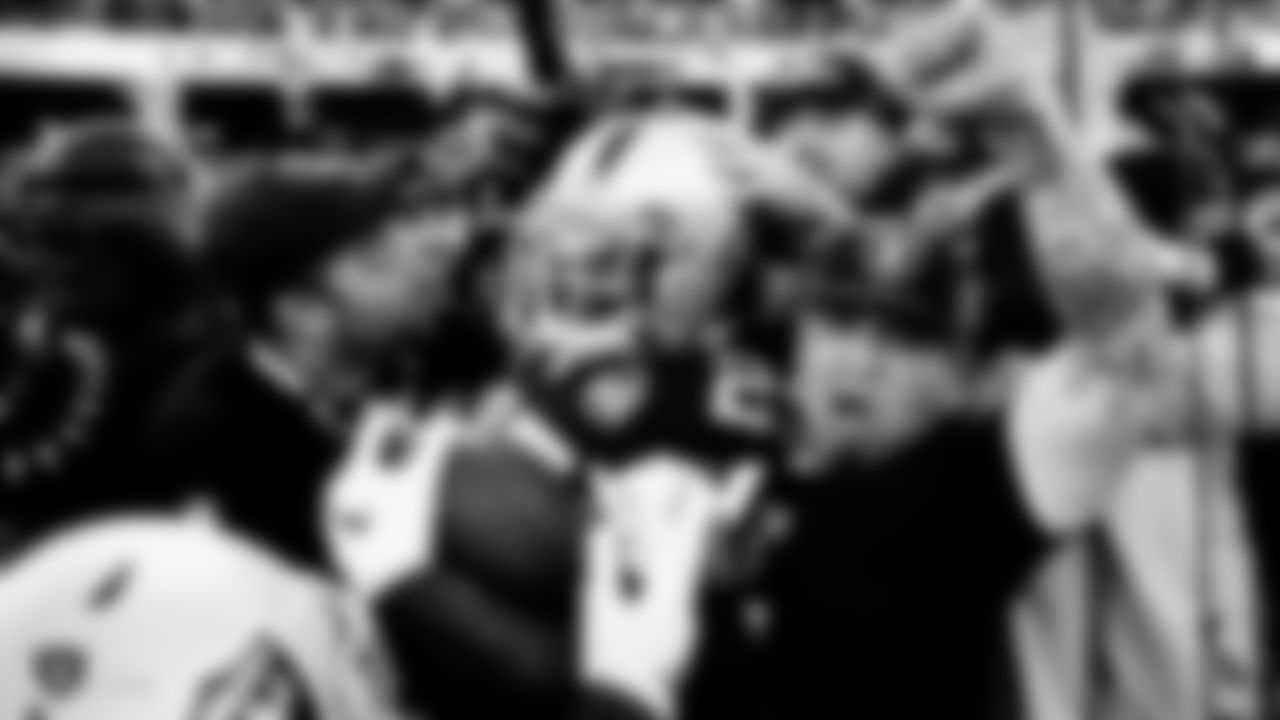 Raiders cornerback Trayvon Mullen (27) celebrates with fans after intercepting a pass during the regular season game against the Cincinnati Bengals.