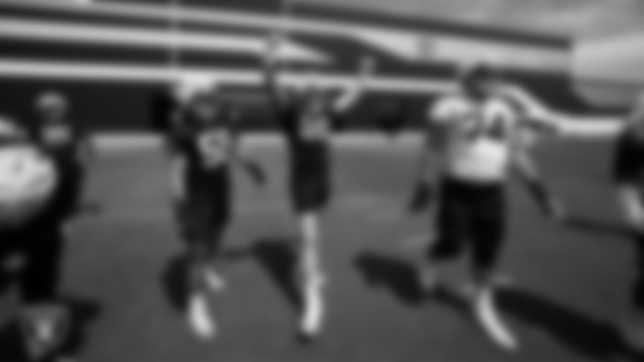 Las Vegas Raiders linebacker Luke Masterson (59), defensive end Maxx Crosby (98) and tackle Kolton Miller (74) on the field for practice at 2023 Training Camp at Intermountain Health Performance Center.