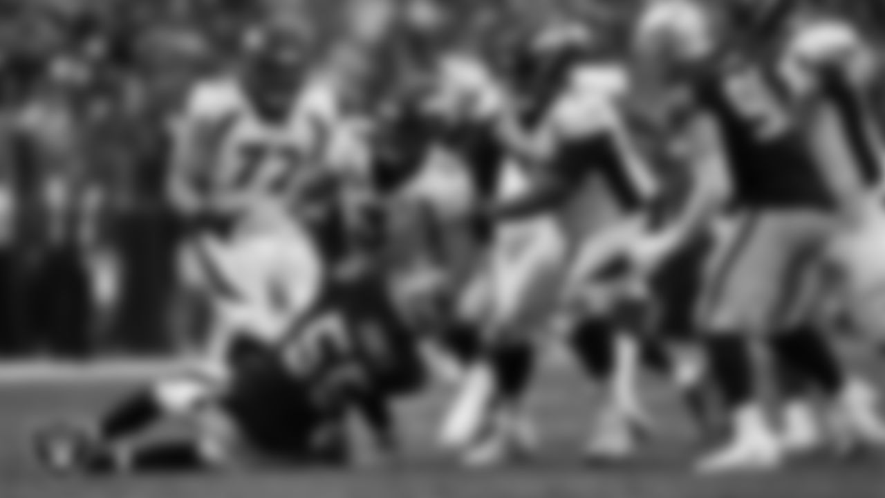 Las Vegas Raiders defensive end Chandler Jones (55) makes a tackle during the regular season home game against the Denver Broncos at Allegiant Stadium.