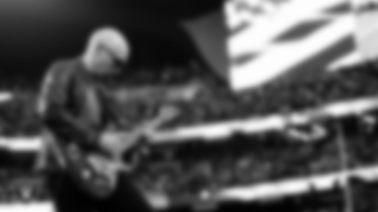 Guitarist and songwriter Joe Satriani performs the national anthem before the Las Vegas Raiders regular season home game against the San Francisco 49ers at Allegiant Stadium.