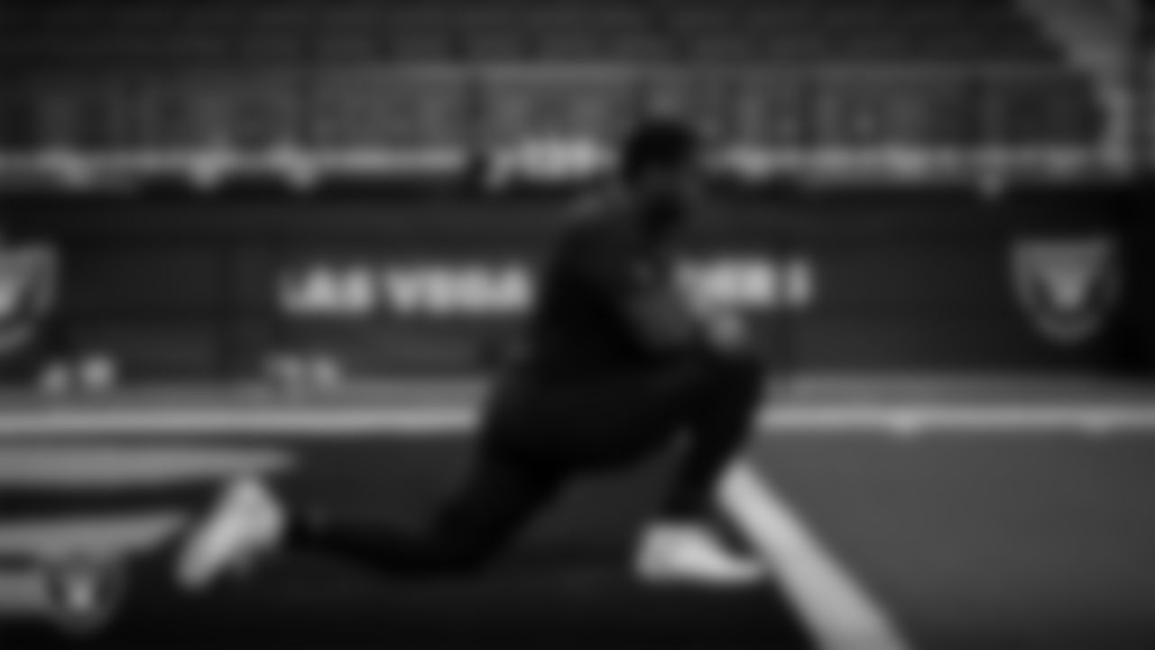 Las Vegas Raiders offensive lineman Tyrone Wheatley Jr. (60) warming up before the preseason home game against the Minnesota Vikings at Allegiant Stadium.