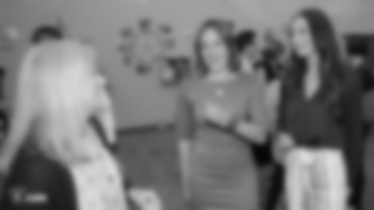 The Raiderettes visit the Clif Bar Headquarters where Girls Inc. of Alameda County hold a College Shower to celebrate the graduations of deserving young women and "shower" them with items needed for college.