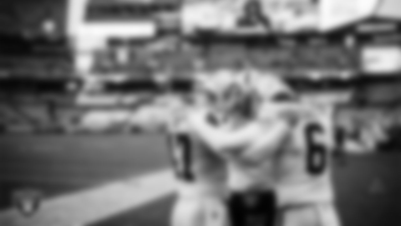 Las Vegas Raiders long snapper Trent Sieg (47), kicker Daniel Carlson (2) and punter AJ Cole (6) huddle before the regular season away game against the Cleveland Browns.