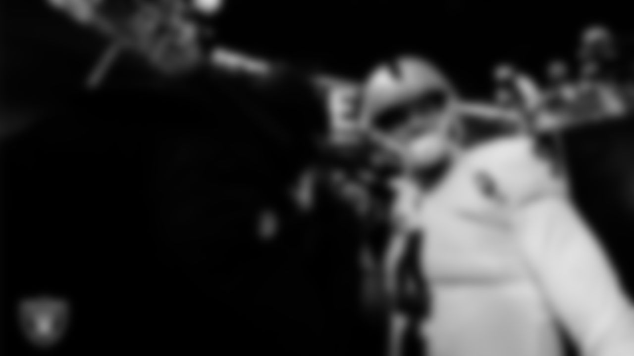 The Las Vegas Raiders quarterbacks huddle in the tunnel before the regular season away game against the Pittsburgh Steelers at Acrisure Stadium.