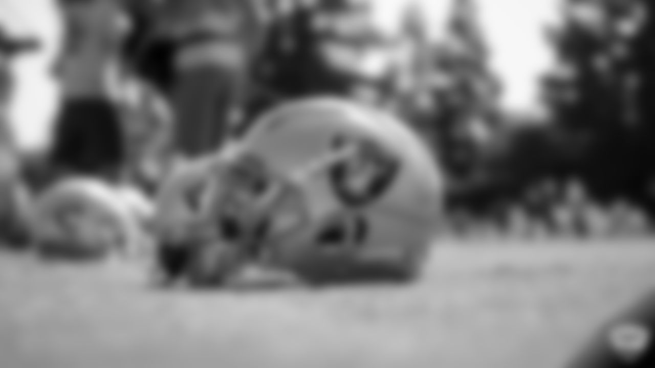 A Raiders helmet on the field for a joint practice with the Los Angeles Rams at 2019 Training Camp.