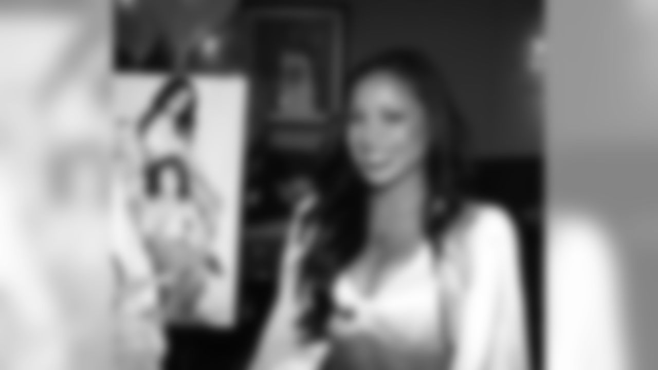 Raiderette Alicia enjoying the calendar release party.