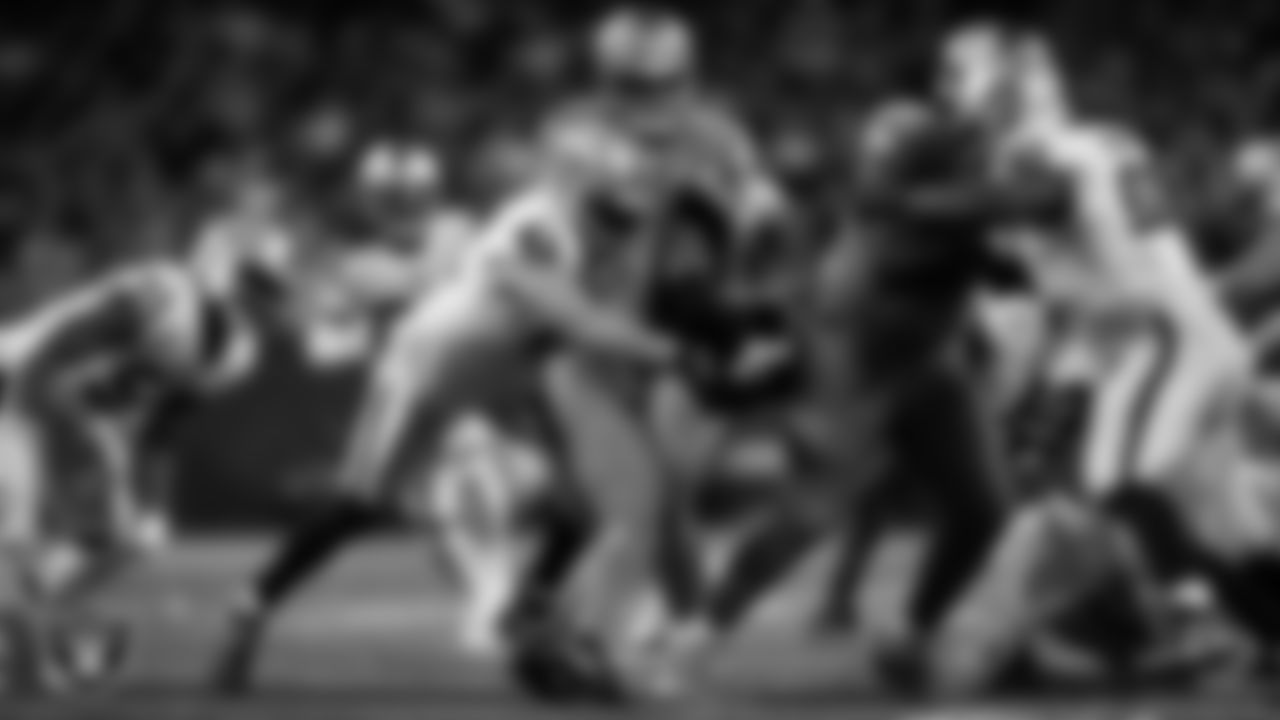 Las Vegas Raiders linebacker Robert Spillane (41) makes a tackle during the regular season away game against the Detroit Lions at Ford Field.