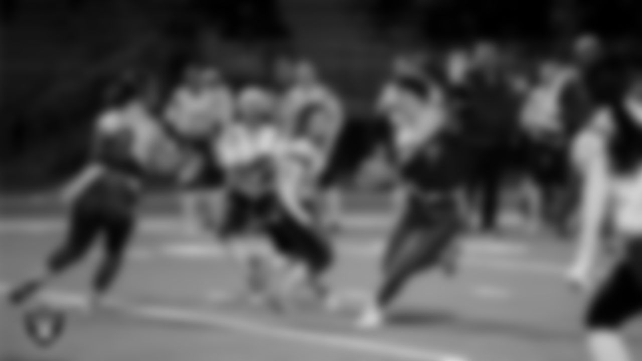 A Shadow Ridge High School player rushes at the Nevada Interscholastic Activities Association (NIAA) Class 5A State Flag Football Championship Showcase at Shadow Ridge High School.