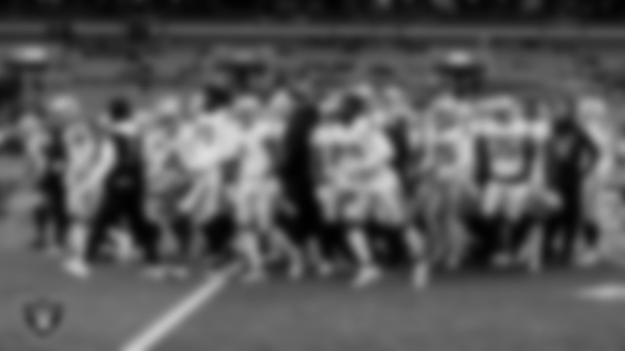 The Las Vegas Raiders huddle during warm ups before the regular season away game against the Cleveland Browns.