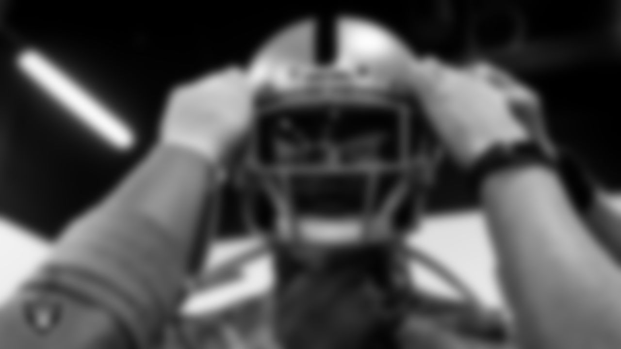 Las Vegas Raiders wide receiver Siaosi Mariner (9) is fitted for his helmet after arriving for 2020 Training Camp.