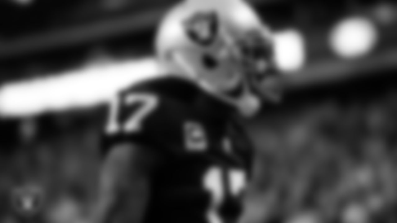 Las Vegas Raiders wide receiver Davante Adams (17) celebrates after making a 31-yard touchdown catch during the regular season home game against the Los Angeles Chargers at Allegiant Stadium.