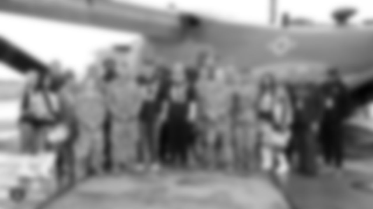 Raiderettes Rachel, Shaniah, Illora, Summer, Raiders long snapper Trent Sieg (47), fullback Alec Ingold (45), tight end Darren Waller (83), linebacker Kyle Wilber (58) and alumni Jim Plunkett, Lincoln Kennedy, and George Atkinson visit U.S. servicemen and women stationed at Royal Air Force Mildenhall.