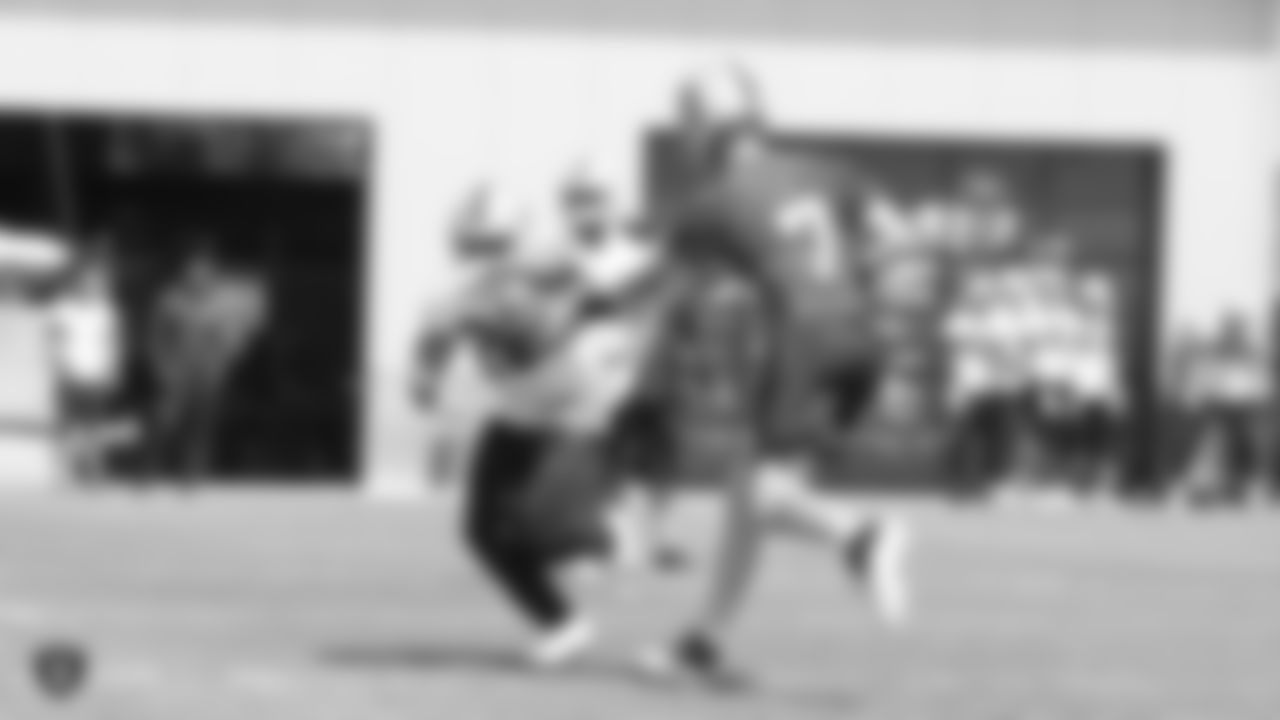 Raiders running back Doug Martin (22) and quarterback Mike Glennon (7) at an Organized Team Activity (OTA) at the Raiders Practice Facility in Alameda, Calif.