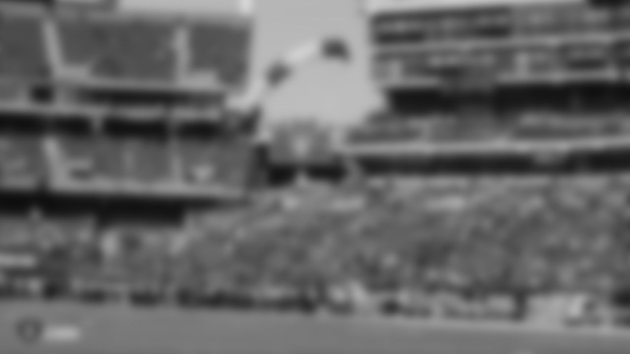 Frog-X Parachute Team parachutes into Oakland-Alameda County Coliseum before the Oakland Raiders regular season game against the Los Angeles Chargers, Sunday, November 11, 2018, in Oakland, California. The Oakland Raiders lost 20-6.