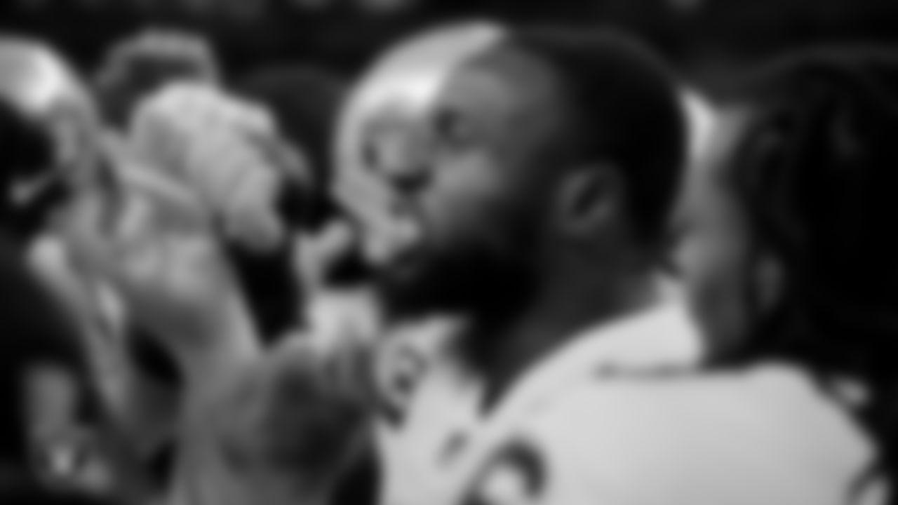 Las Vegas Raiders defensive end Yannick Ngakoue (91) fires up the team in a huddle during warm ups before the regular season away game against the Indianapolis Colts.