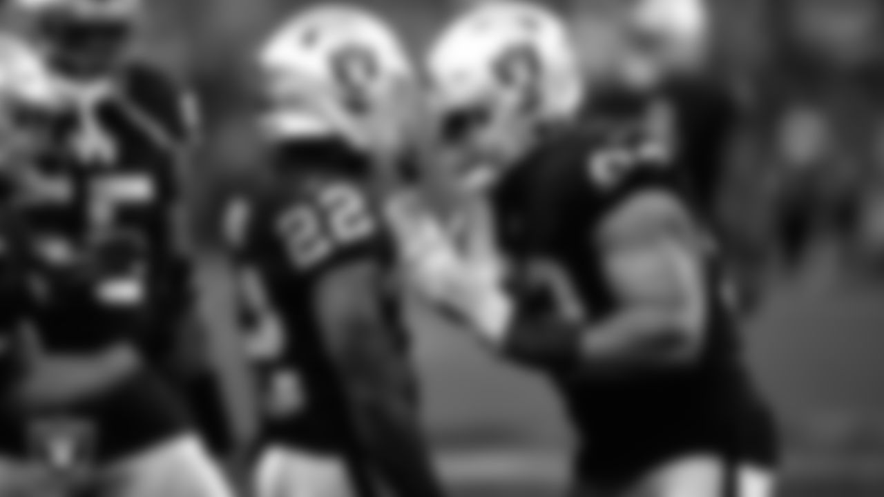 Las Vegas Raiders cornerback Keisean Nixon (22) is congratulated by defensive tackle Solomon Thomas (92) after making a tackle during the regular season home game against the Denver Broncos.