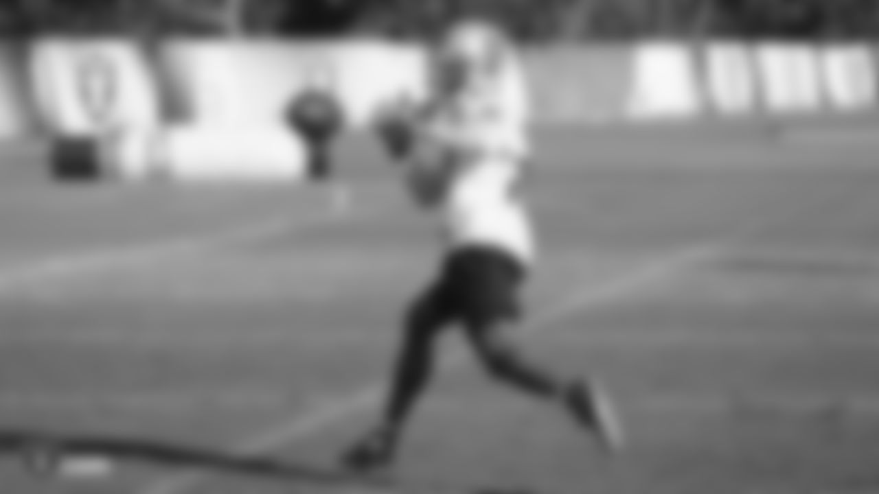 Raiders wide receiver Rico Gafford (10) goes for a catch during practice.