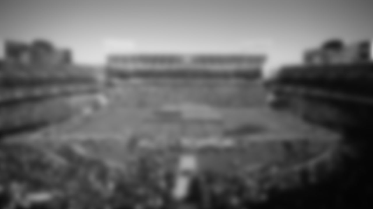 The American flag is displayed by season ticket members on the field during the national anthem before the Raiders regular season game against the Detroit Lions.