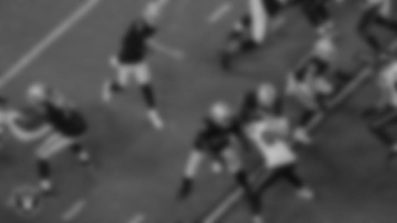 Las Vegas Raiders guard/tackle Jaryd Jones-Smith (72), quarterback Nathan Peterman (3), guard Lester Cotton Sr. (67), center Nick Martin (66) and running back Garrett Groshek (46) during the preseason game against the Seattle Seahawks at Allegiant Stadium.