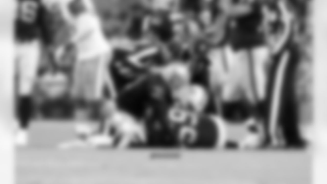 LS Jon Condo recovers the fumble forced by TE Brian Leonhardt on the Miami punt return.