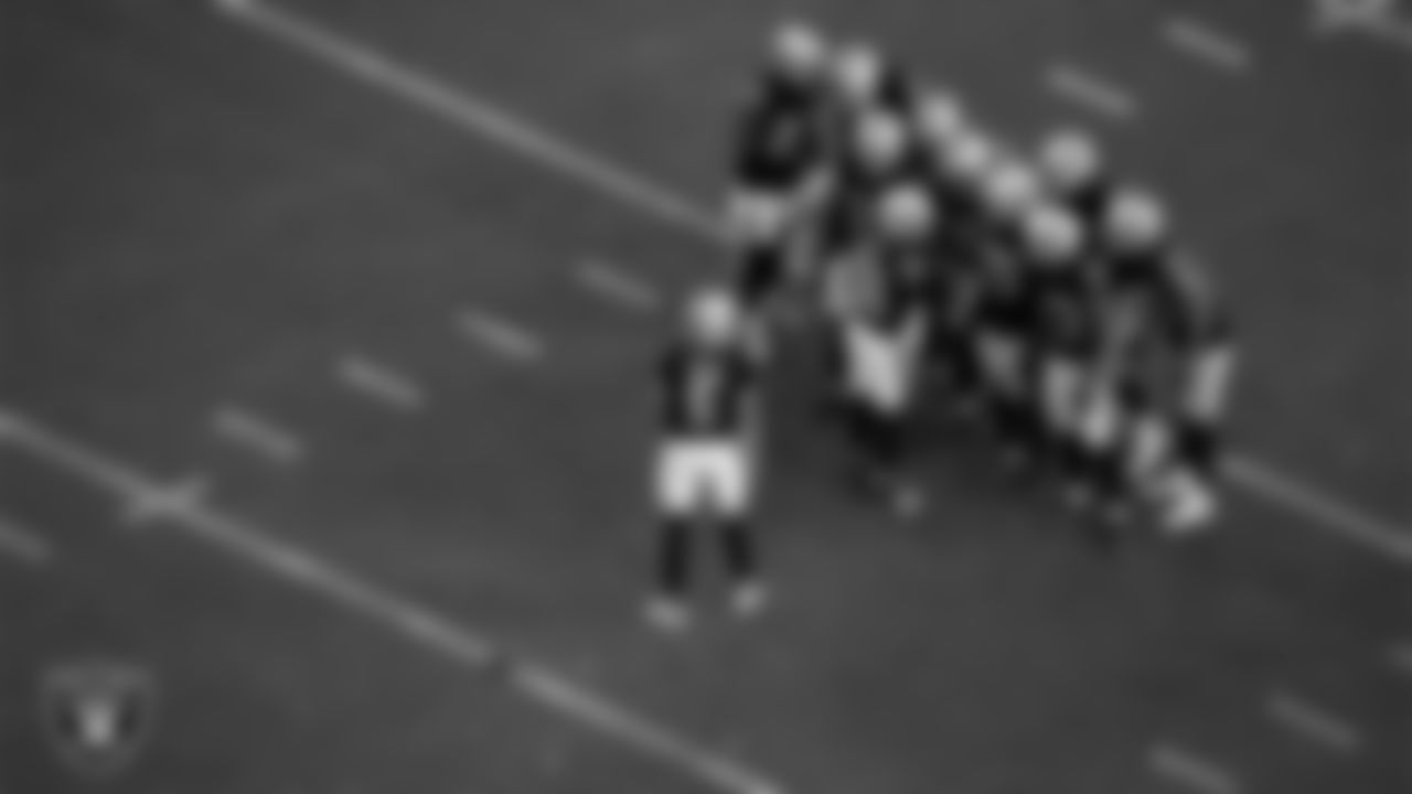 The Las Vegas Raiders special teams unit huddles before a kickoff during the preseason home game against the Seattle Seahawks at Allegiant Stadium.