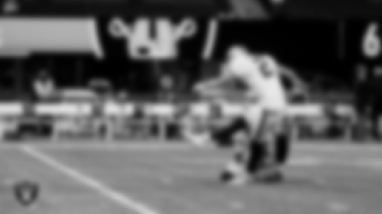 The Raiders warm up before the regular season game against the Atlanta Falcons at Mercedes-Benz Stadium.