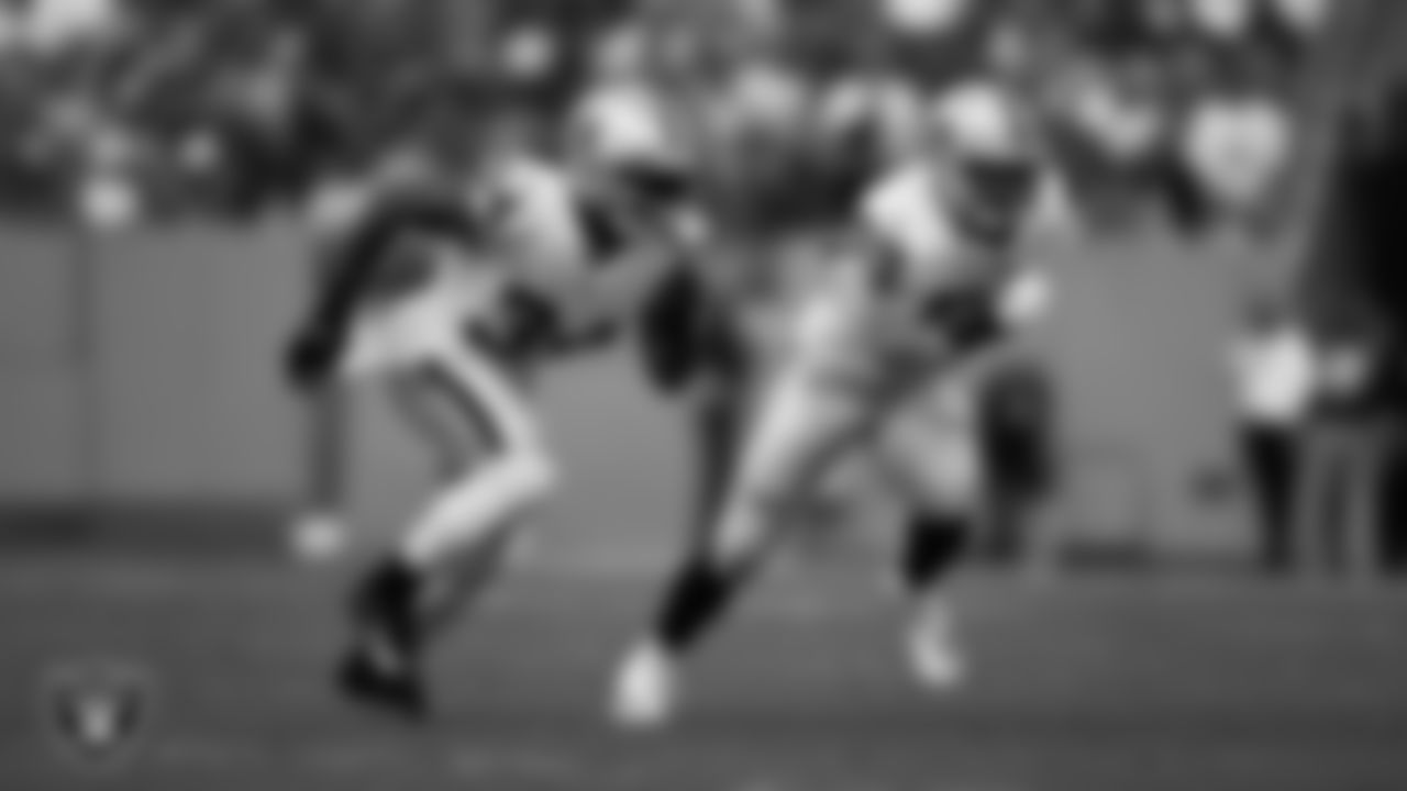 Las Vegas Raiders running back Brandon Bolden (34) and linebacker Luke Masterson (59) head down field after a kickoff during the regular season away game against the Tennessee Titans at Nissan Stadium.